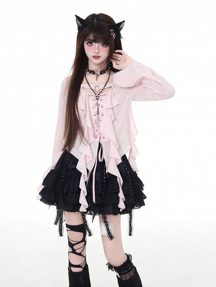 Top en mousseline rose à lacets noirs/clairs, ourlet asymétrique à volants et patte de boutonnage asymétrique