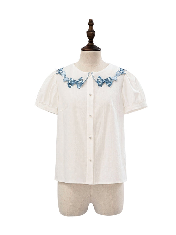 ブルーの蝶結びトリムカラーのホワイト半袖ブラウス