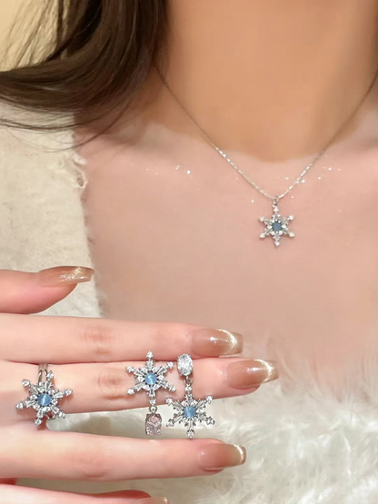 Silberne Ohrringe/Ring/Halskette in Schneeflockenform