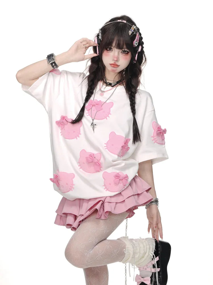 白/ピンクの蝶結びTシャツ柄 かわいい子猫