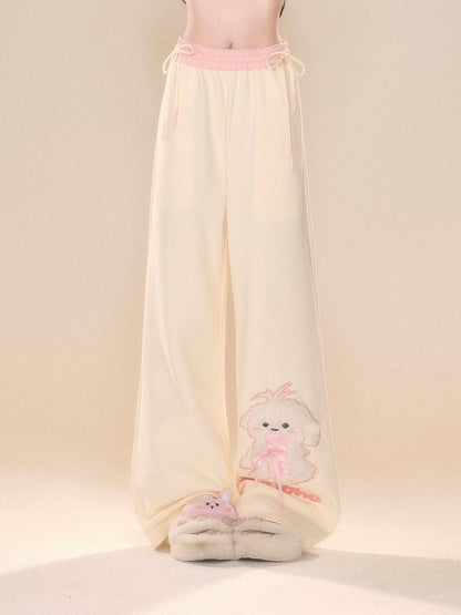 Beige Wide-Leg Pants with Pink Waistband and Embroidered Puppy Design
