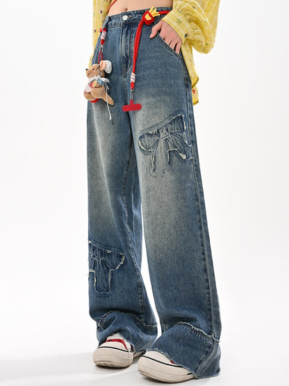 未加工ワイドレッグジーンズ ウエストリボンアップリケ ブルー ローヘム ヴィンテージ