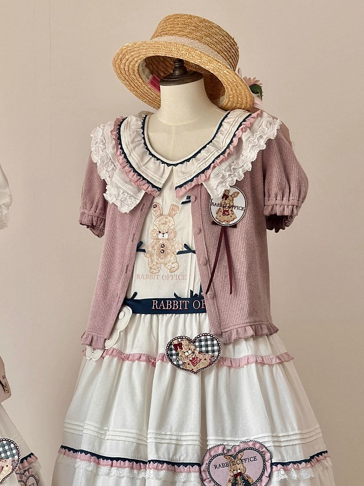 Rosa Strickjacke mit kurzen Puffärmeln