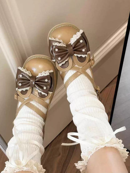 耳の上部に茶色の十字形装飾のビーズリボンのウサギのデザイン