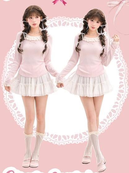 Rosafarbenes Slim-Fit-Top mit Rundhalsausschnitt und Spitzenbesatz