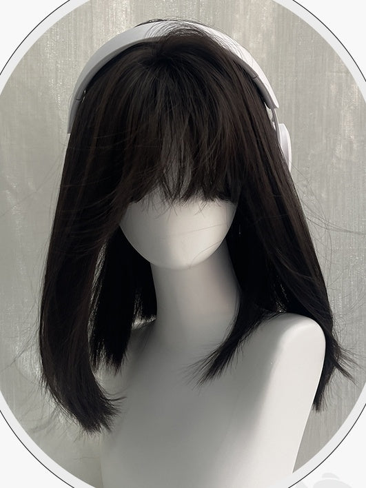 Schwarze, über der Brust lange, glatte Kunsthaarperücke mit vollem Pony
