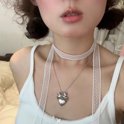 Halskette mit Schleifenanhänger in Silber