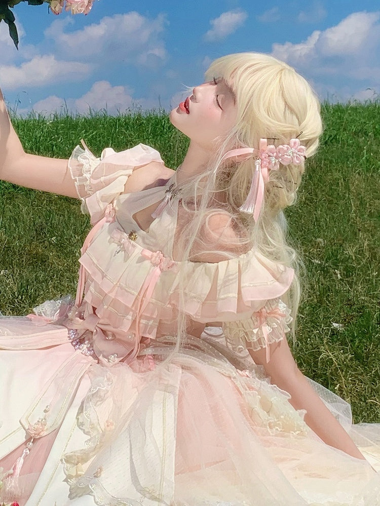 ピンクの桃の花のタッセルヘアクリップ