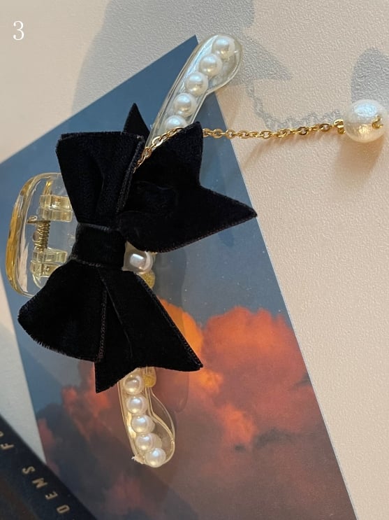 ビーズの蝶結びの黒い爪クリップ装飾