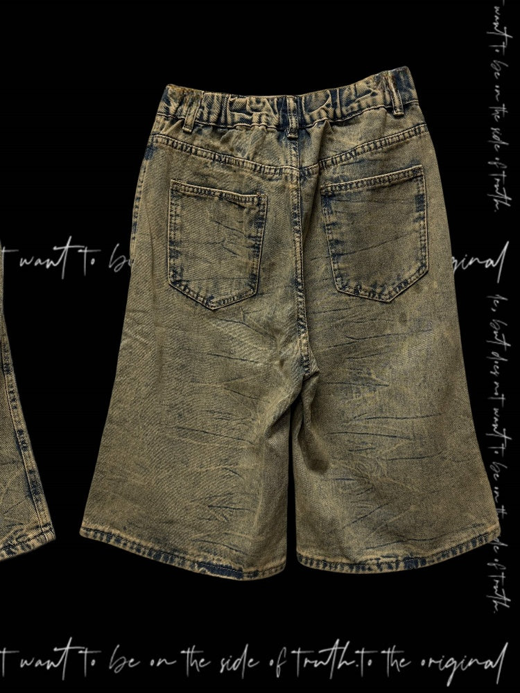 パンクなウェイストランドクロスのアップリケ、イエローのダメージ加工の穴あきデニムショーツ、Y2K