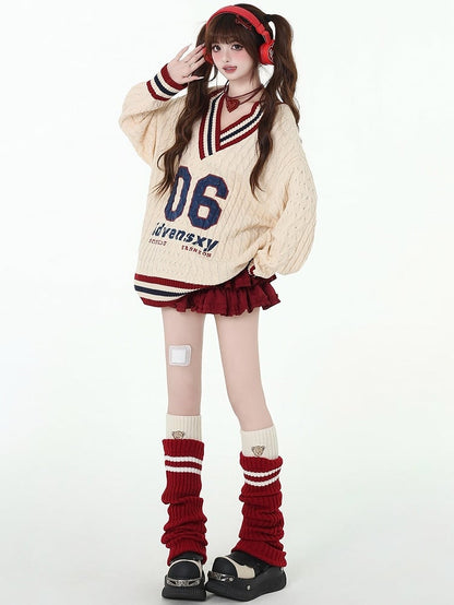 Apricot Preppy Loose Sweater mit Zahlen und Buchstaben