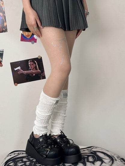 Verzierte Schleifenstrumpfhose mit Strasssteinen in Nude