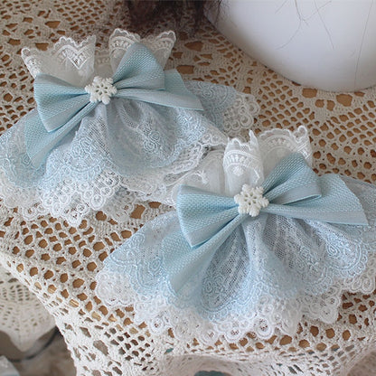 Blaue Weihnachts-Handgelenkmanschetten mit Schleife und Spitzenbesatz