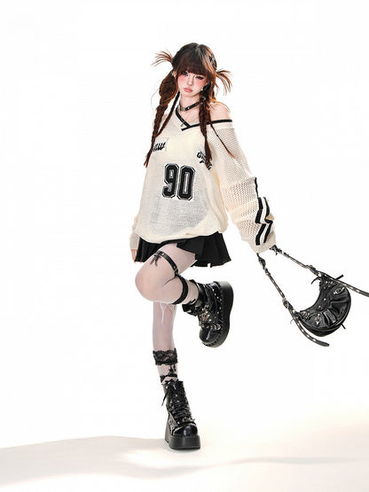 Schwarz/weißes, asymmetrisches Oberteil mit Sonnenschutz und Hohlsaum