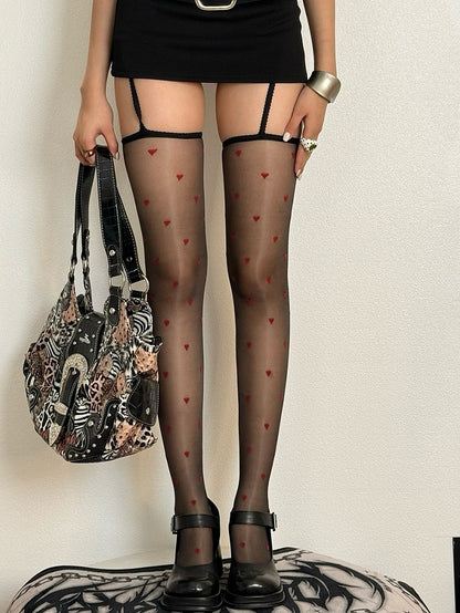 Strapsstrümpfe mit Herzmuster in Nude/Schwarz