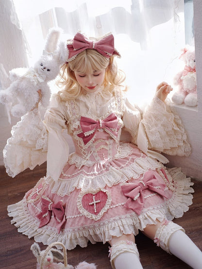 ピンクの蝶結びとハート型のアップリケスカートのスイートロリータドレス