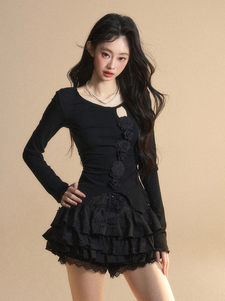 Schwarzes Top mit rundem, glamourösem Detail und gestricktem Halsausschnitt, Blumenverzierung und Cut-Outs