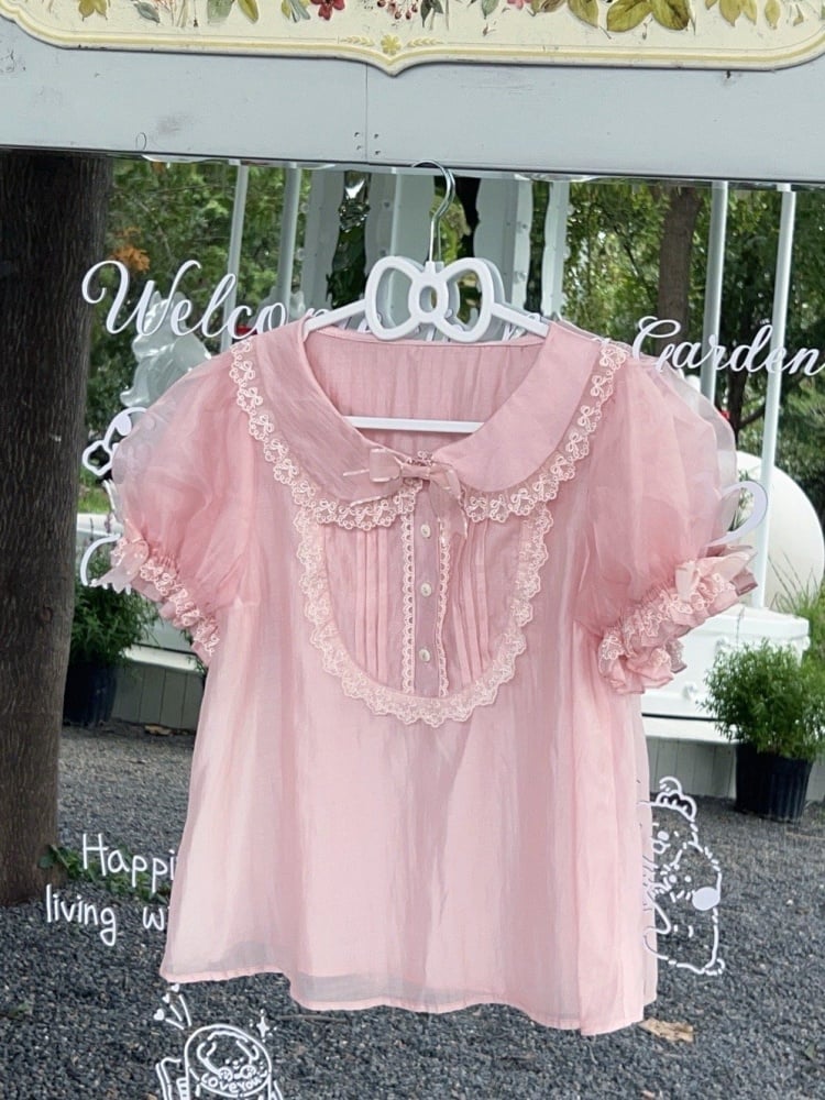 Rosa Bluse mit Puffärmeln und Peter-Pan-Kragen