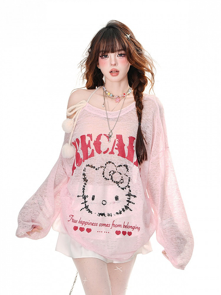 Halbtransparentes Sonnenschutz-Top mit Kätzchen-Print und Pompon-Akzenten in Rosa/Weiß mit asymmetrischem Ausschnitt