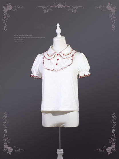 赤いトリムと白いコントラストのロリータピーターパンカラーのパフスリーブのスイートブラウス