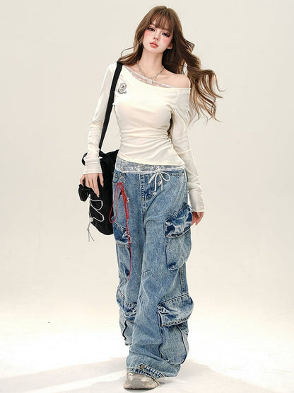 Aprikose/königsblaues, schmal geschnittenes Oberteil mit Spitzenakzenten und asymmetrischem Ausschnitt