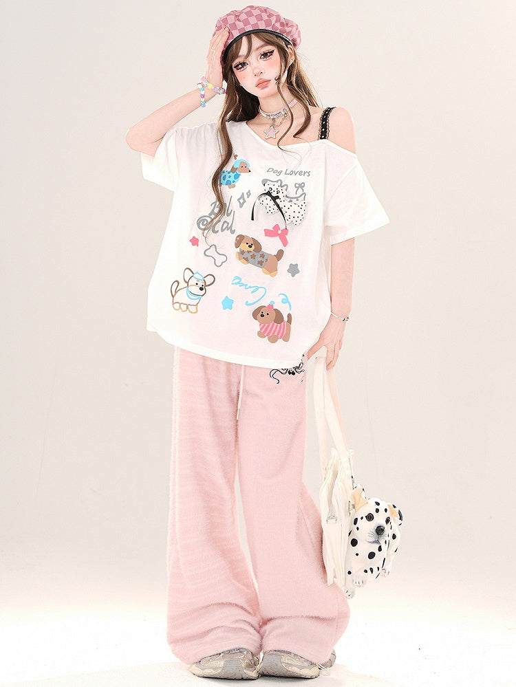 Weiß/Schwarzes lockeres T-Shirt mit asymmetrischem Ausschnitt und Cartoon-Welpen