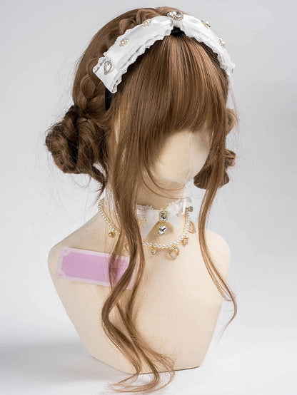 ジライケイ ラインストーンとビーズで飾られたレーストリム 蝶結び KC