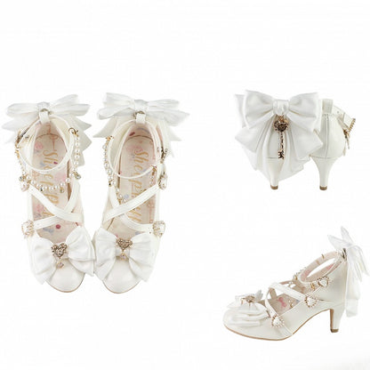 デザイン：ハートにクロスビーズ、トップチャーム、ホワイトリボン