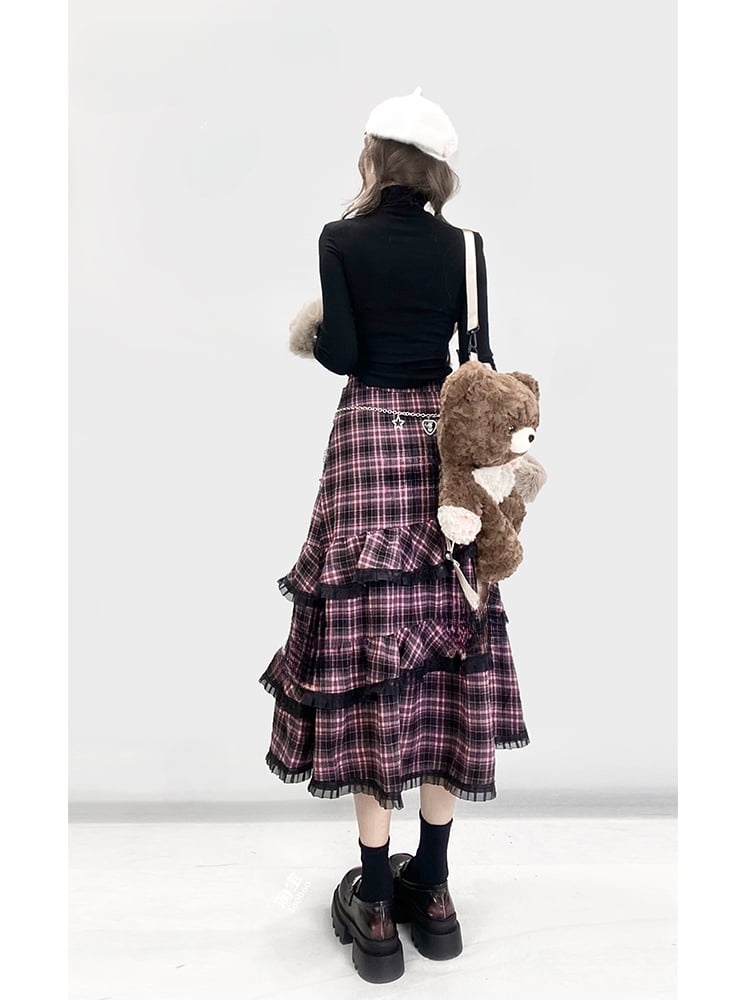 取り外し可能な袖が付いたブラックのハイネック パピー トップス