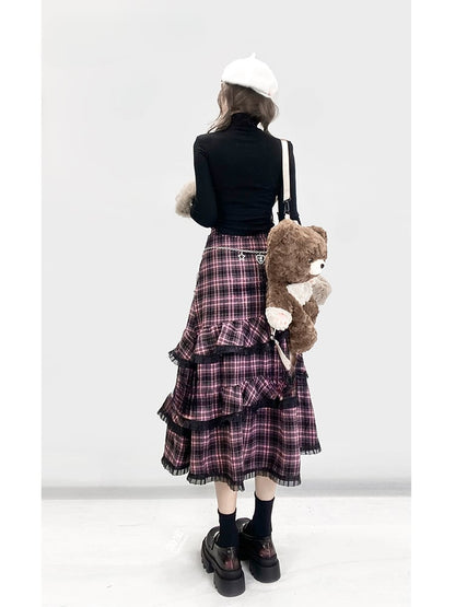 取り外し可能な袖が付いたブラックのハイネック パピー トップス