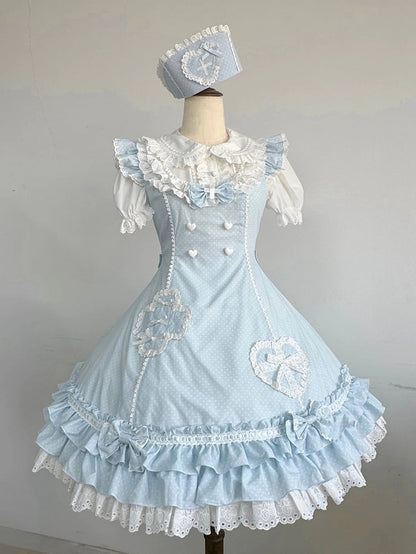 Blaues Lolita-Kleid mit Rüschensaum und Lagenmuster und Polka-Dot-Muster