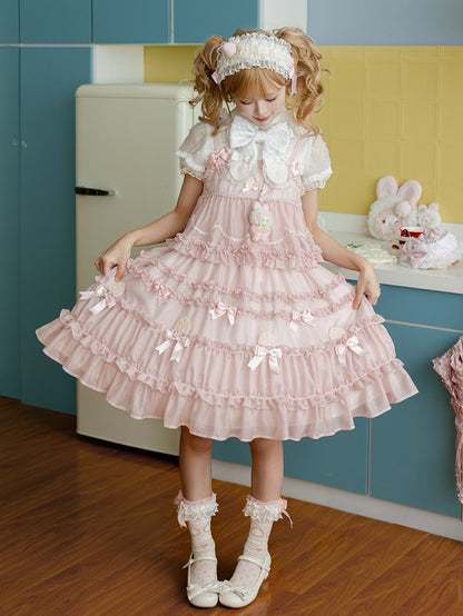 Süßes Lolita-Kleid mit rosa Schleifenakzenten und Rüschenbesatz