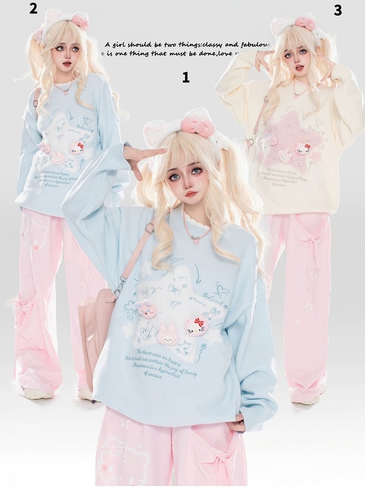 ライトブルー/ライトイエローの星のアップリケがキュートな猫ちゃんをあしらったゆったりセーター