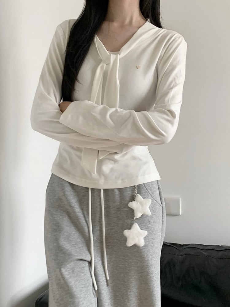 Haut long blanc/gris à nouer au col avec manches et taille cintrée