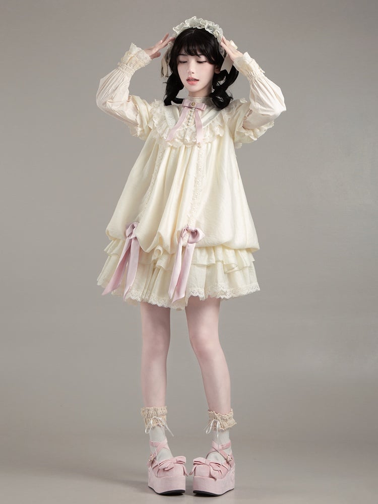Beiges Lolita-Kleid mit kurzen, weiten Ärmeln und Kordelzug und Rosettendetails