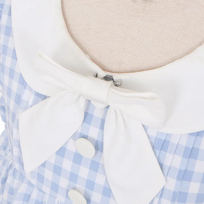 Blaue Taschen Herzförmiges süßes Kleid Bowknots Plaid Flatterärmel Licht