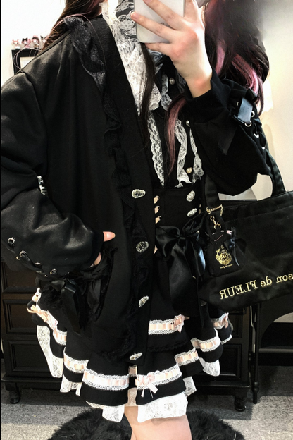 Strickjacke mit Spitzenschleife und losem Band