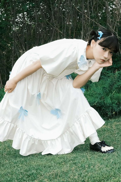 Prinzessinnenkleid mit Ballonärmeln und Schleife