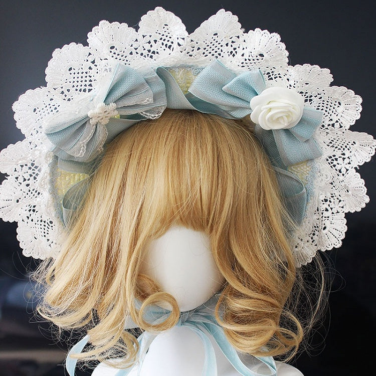 ピンク/ブルーの花柄リボンディテール、レーストリムのボンネット