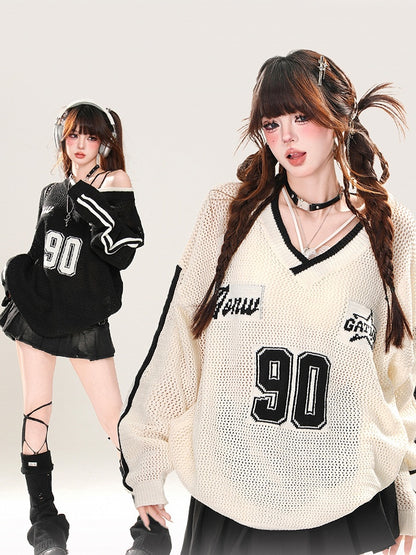 Schwarz/weißes, asymmetrisches Oberteil mit Sonnenschutz und Hohlsaum