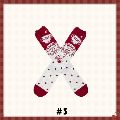 Rote süße karierte Socken mit gestreiftem Tupfenmuster