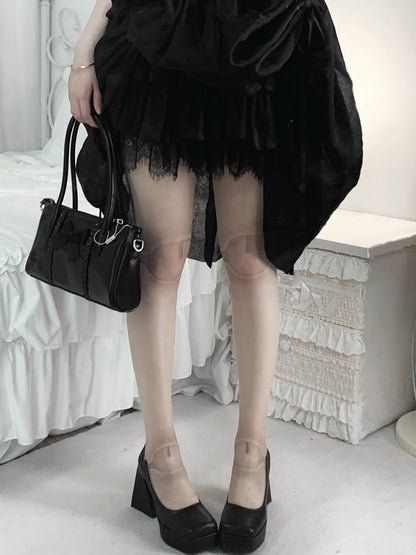 Schwarze und graue Knie- und Knöchelstrumpfhose