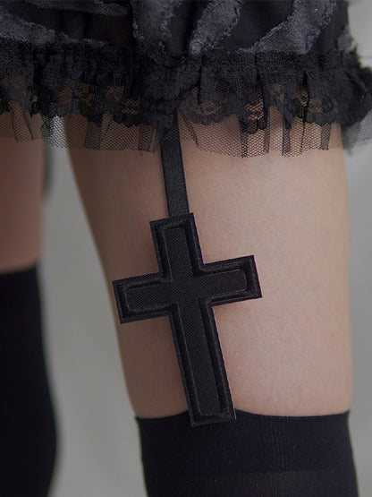 Straps-Strümpfe mit Kreuz-Applikation in Schwarz