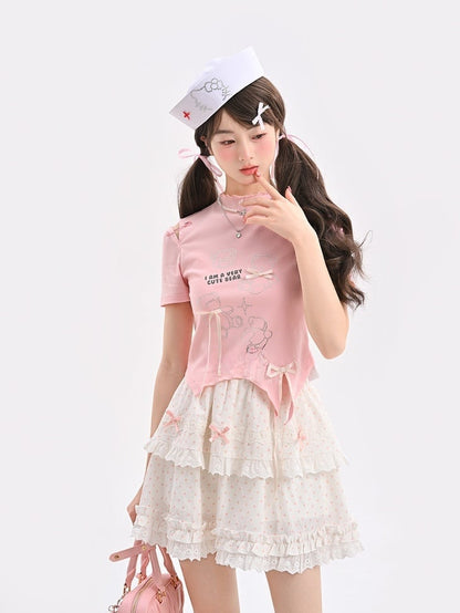 T-Shirt-Saum, gebogen, rosa Rüschen-Ausschnitt, Teddybär-Strasssteine, Schleifen-Akzente