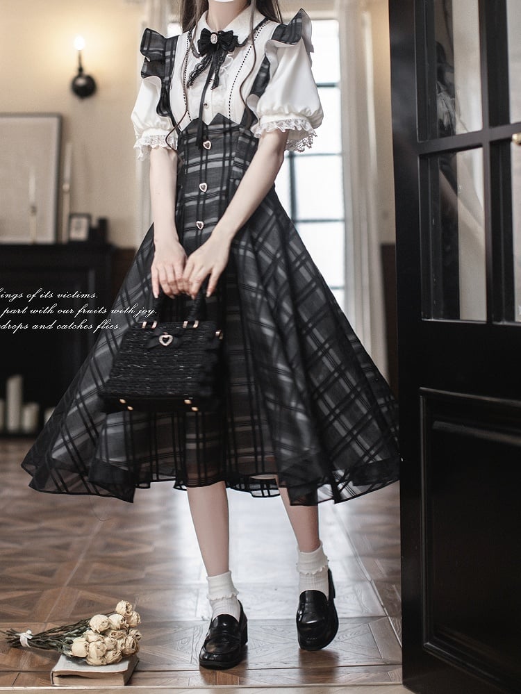 Baskisch mit Jirai-Overallkleid in Kei-Schwarz mit Karomuster, lange Taille, Version mit umgedrehten Flatterärmeln