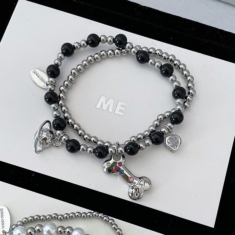 ホワイト/ブラック/レッド サトゥルナンド ボーンチャーム ビーズブレスレット