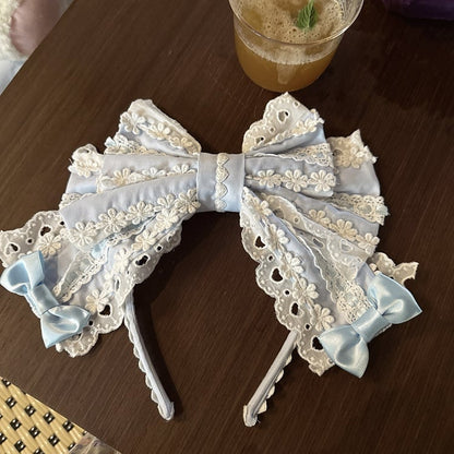 Serre-tête KC à nœud papillon en noir, bleu, rose, blanc