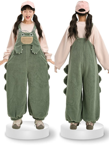 かわいい恐竜の緑のぬいぐるみオーバーオール