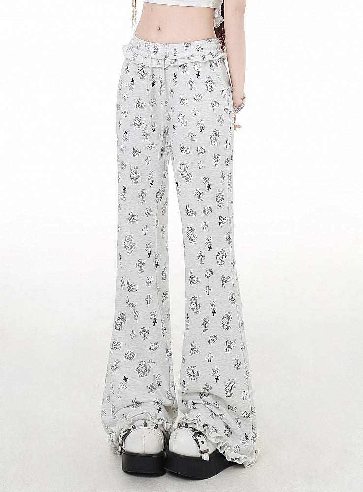 グレーのカフス、ローウエスト、キティとクロスプリント、軽やかで華やかなフリルフレアパンツ