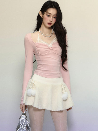 Rosa Spitzenoberteil mit Schmetterlingsausschnitt und Neckholder und langen Ärmeln